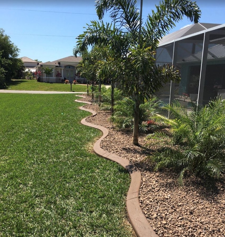 Kustomized Kurbing Elevates Outdoor Living with Expert Palm Tree Installation in Southwest Florida